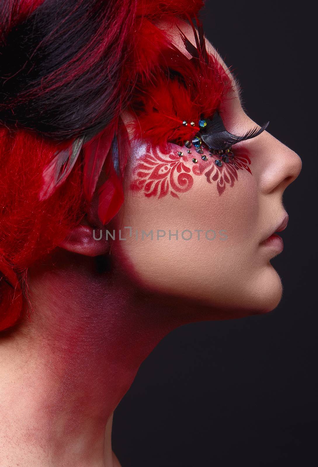 Young girl with red hair and creative ingenious makeup by Multipedia