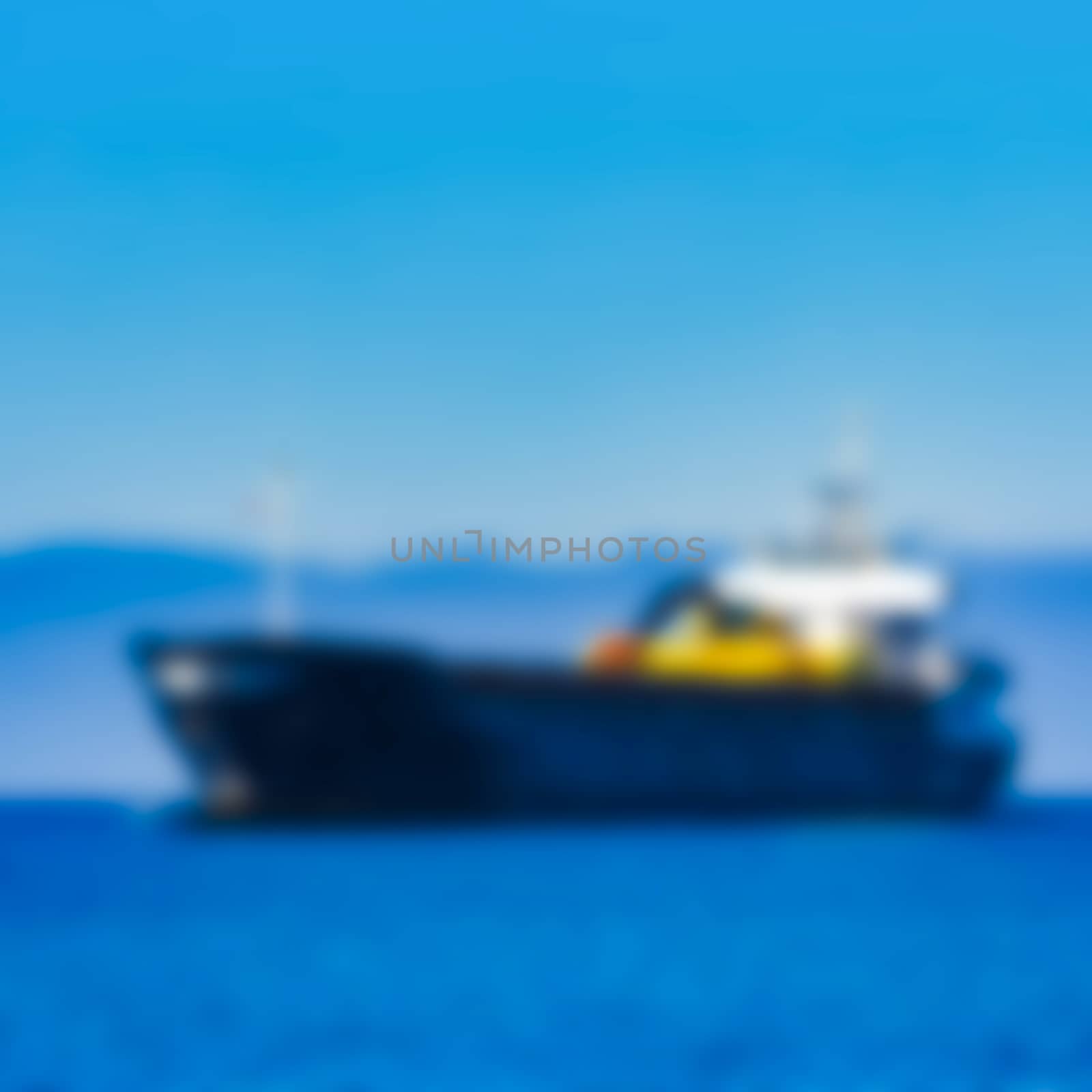 Cargo ship - soft lens bokeh image. Defocused background