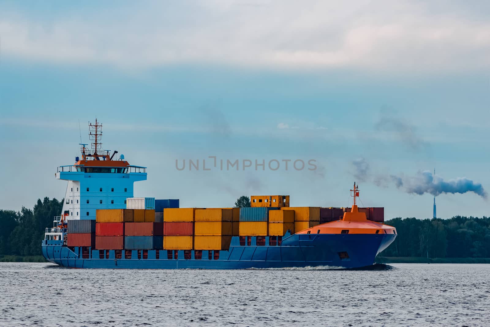Blue container ship. Global logistics and merchandise transfer
