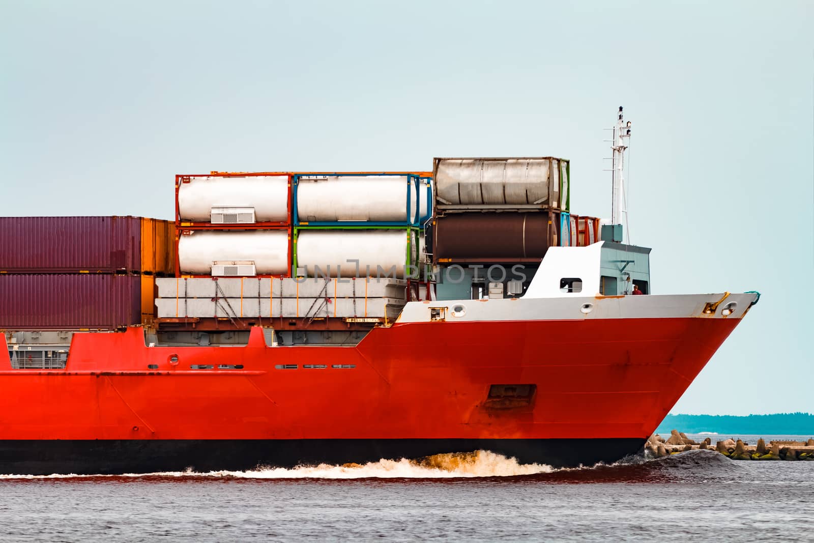 Red container ship. Logistics and production export