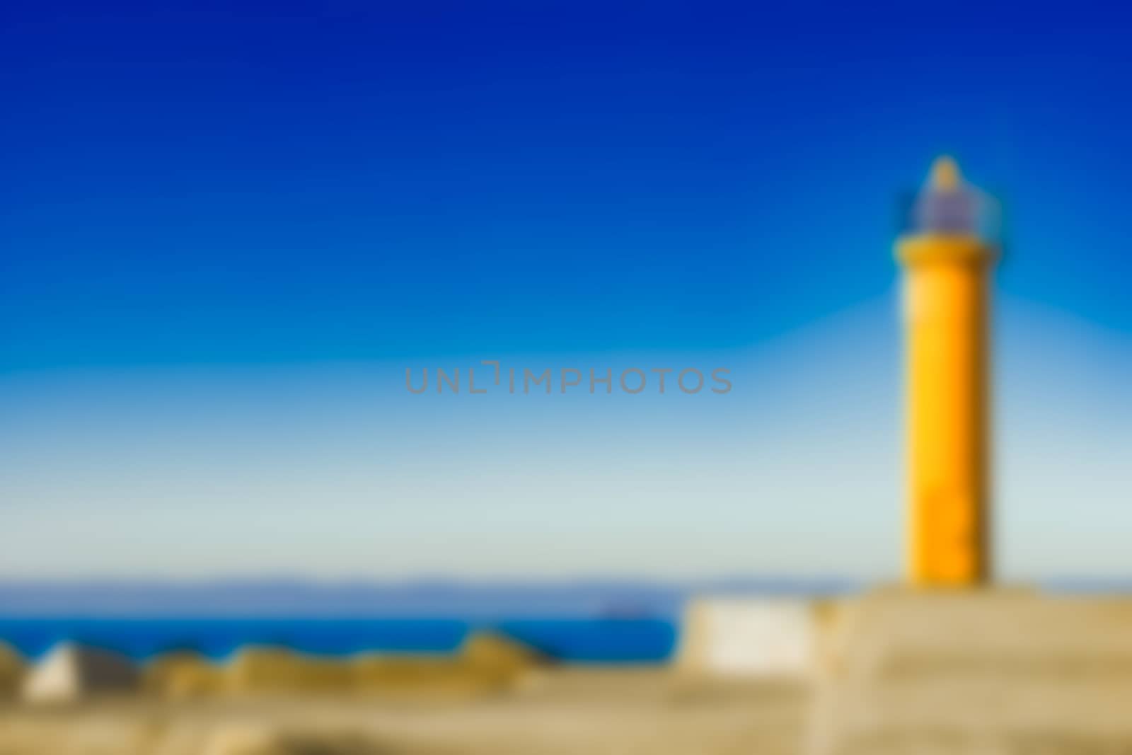 Yellow lighthouse - blurred image by sengnsp