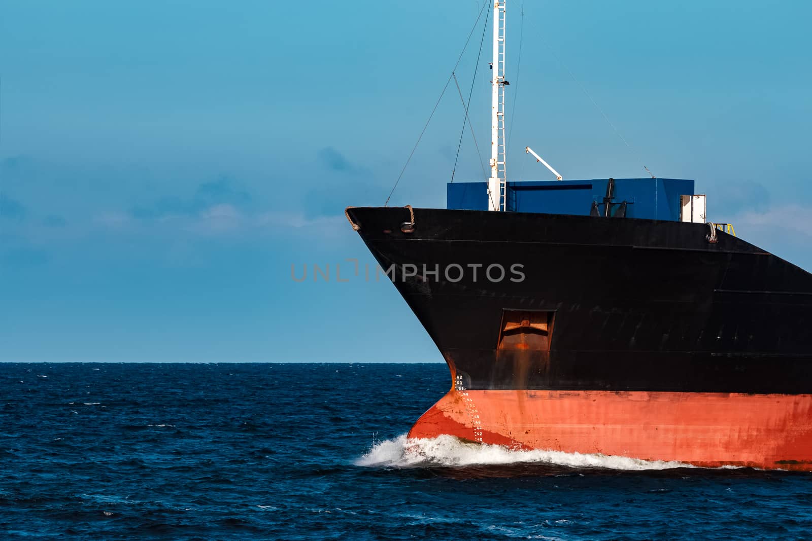 Black cargo ship by sengnsp