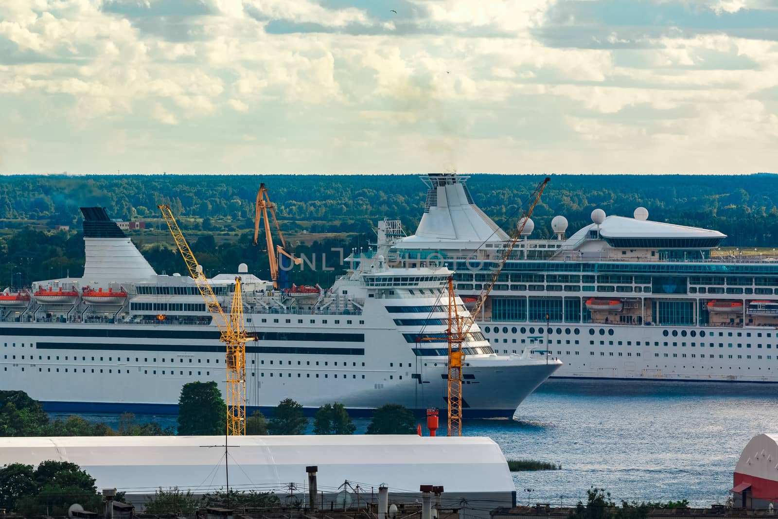 Two cruise liners in Riga. Tour travel and spa services