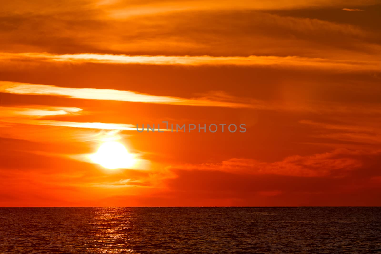 Hot and romantic sunset over the Baltic sea. Calm landscape