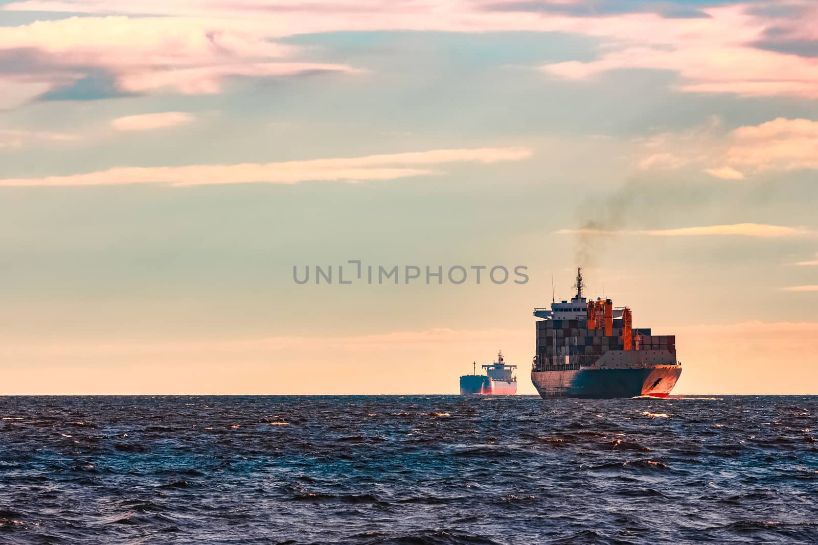 Blue container ship. World logistics and production transfer