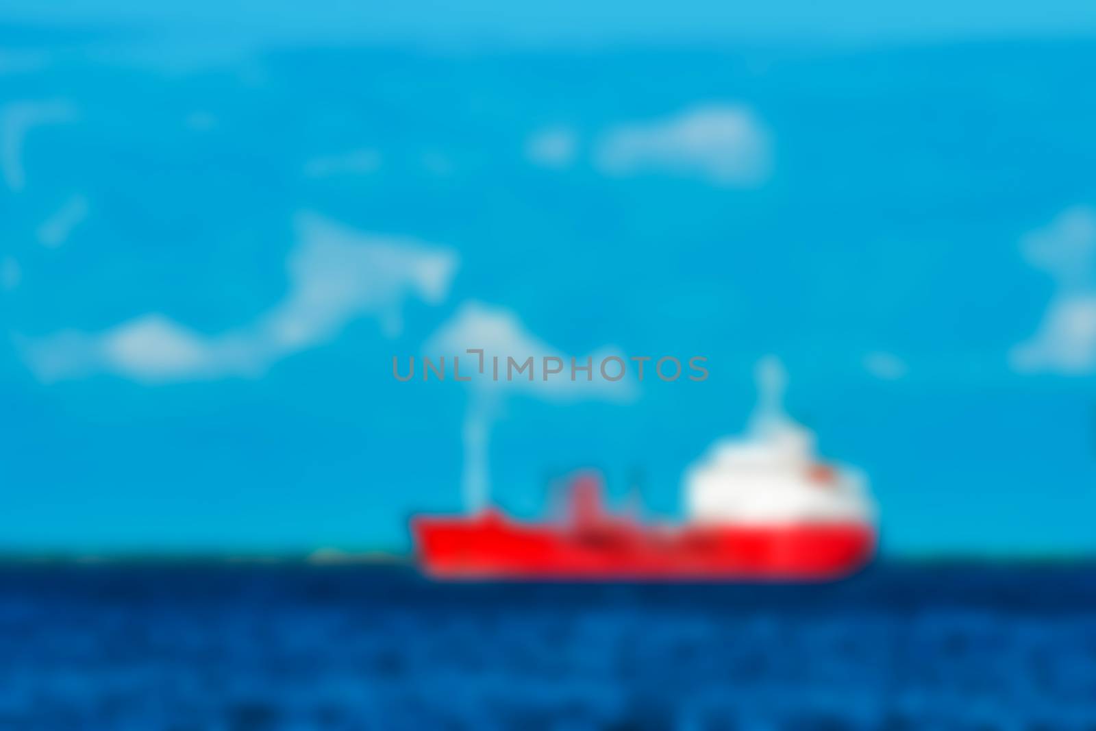 Cargo ship - soft lens bokeh image. Defocused background