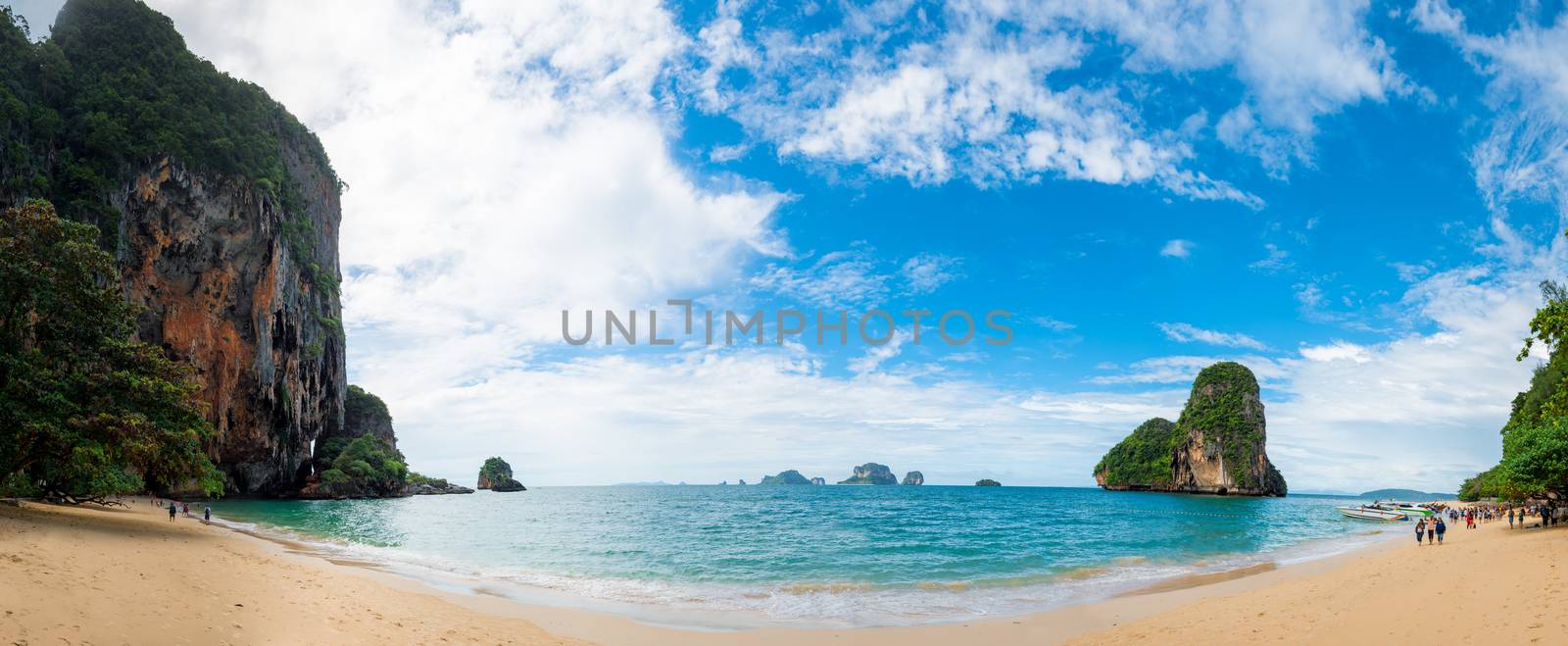 Beach Phra Nang on a sunny day panoramic view, tourists in the f by kosmsos111