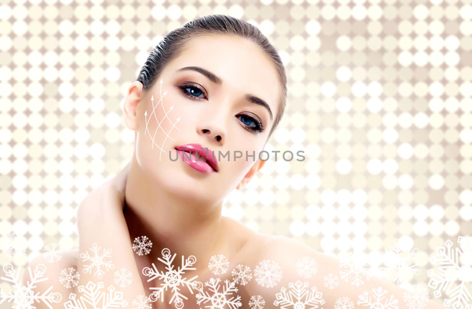 Young beautiful woman with clean fresh skin, abstract background with snowflakes