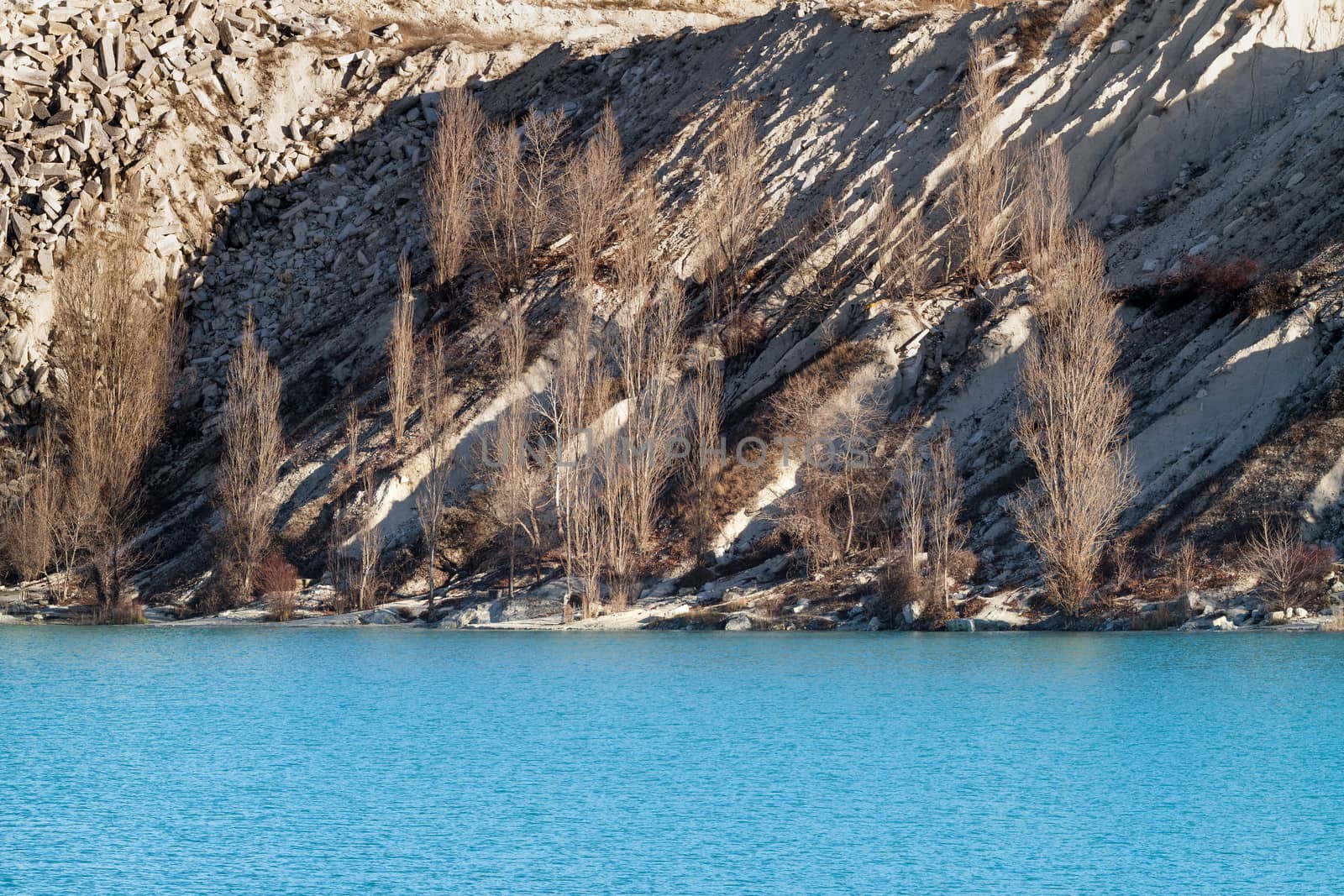 Lake emerald-turquoise color formed in an old quarry