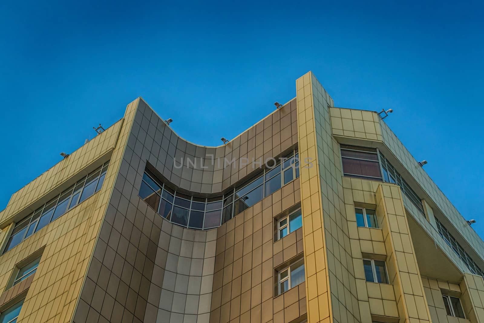 building on the background of blue sky and the city up buildings