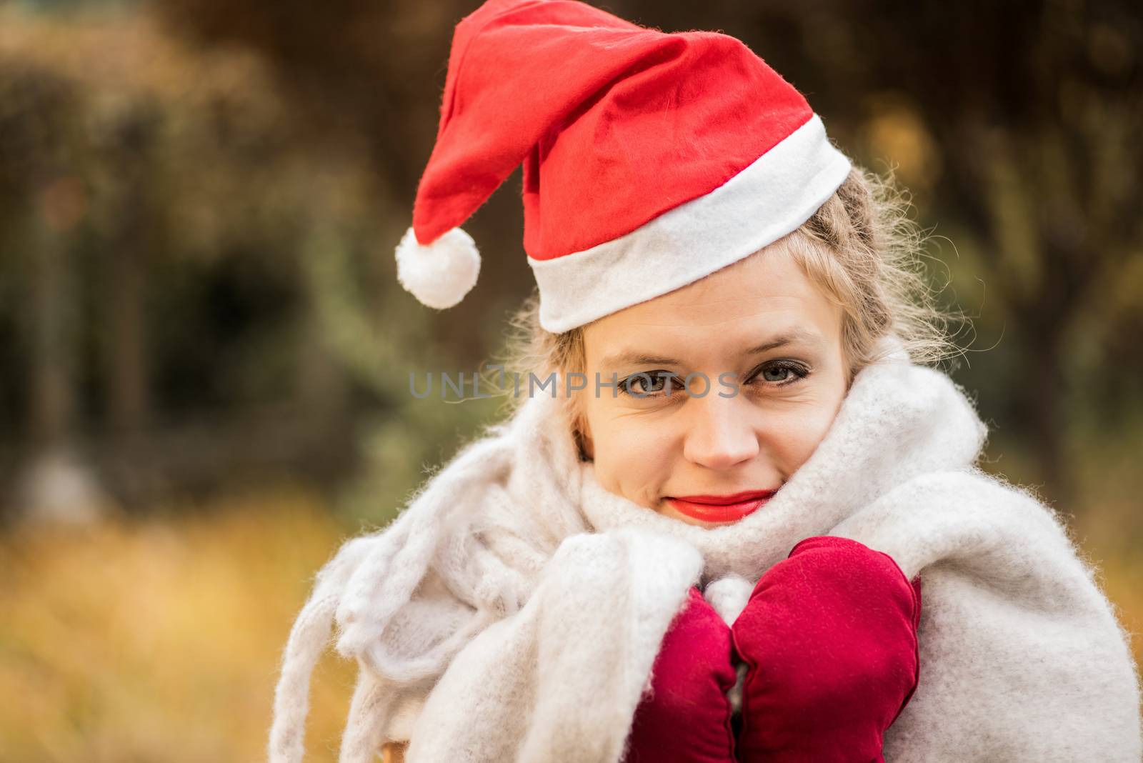 young caucasian woman with red xmas hat by Desperada