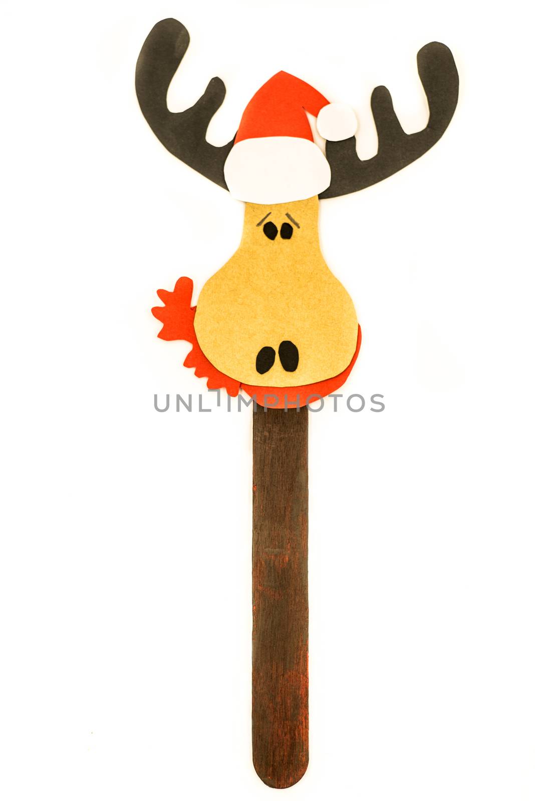 cute christmas hand made craft. reindeer in hat and scarf popsicle stick bookmark. merry christmas and happy new year concept