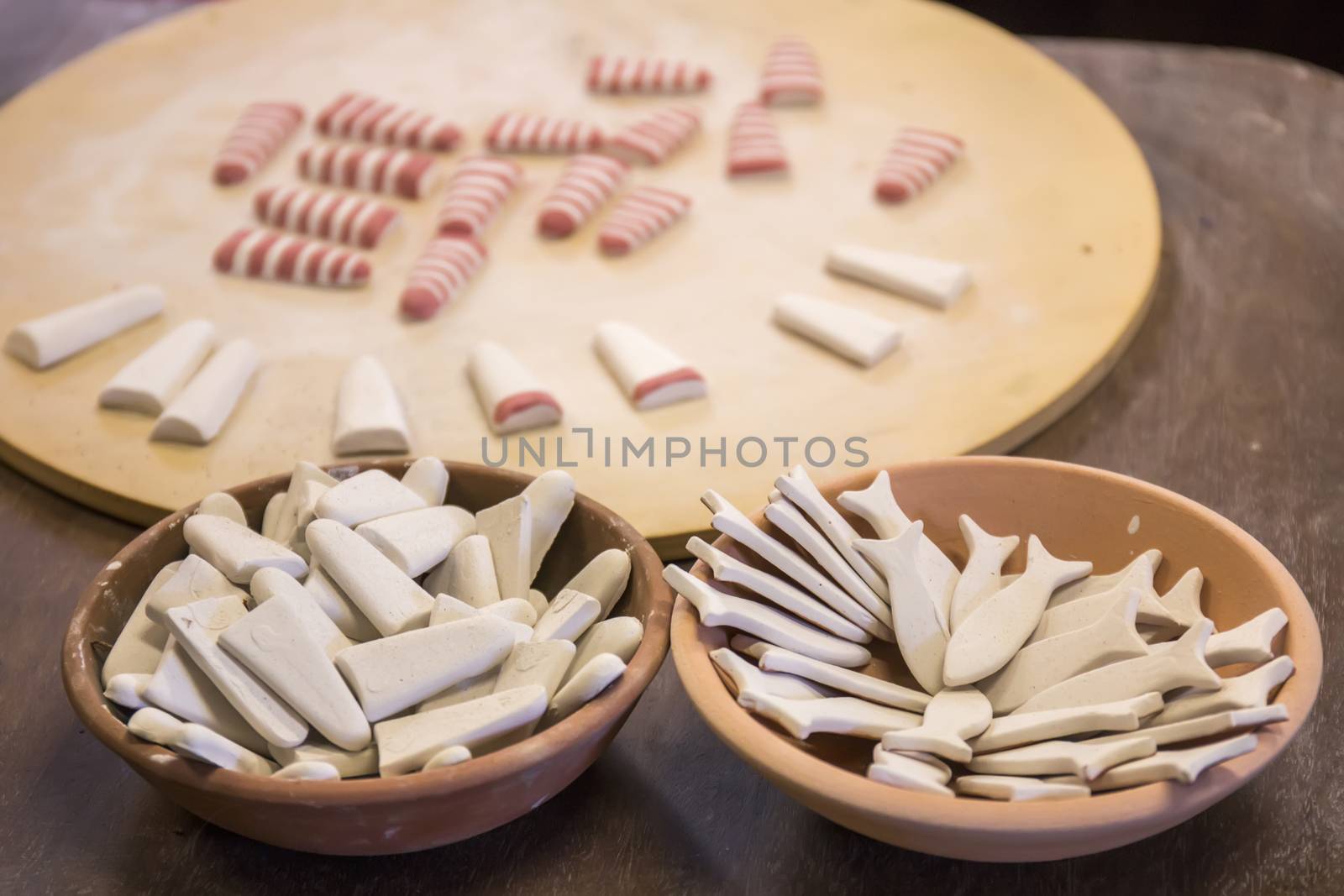 Close up view of souvenir ceramic workshop, with unfinished pieces.
