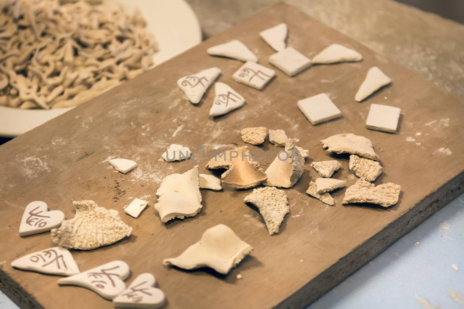 Close up view of souvenir ceramic workshop, with unfinished pieces.
