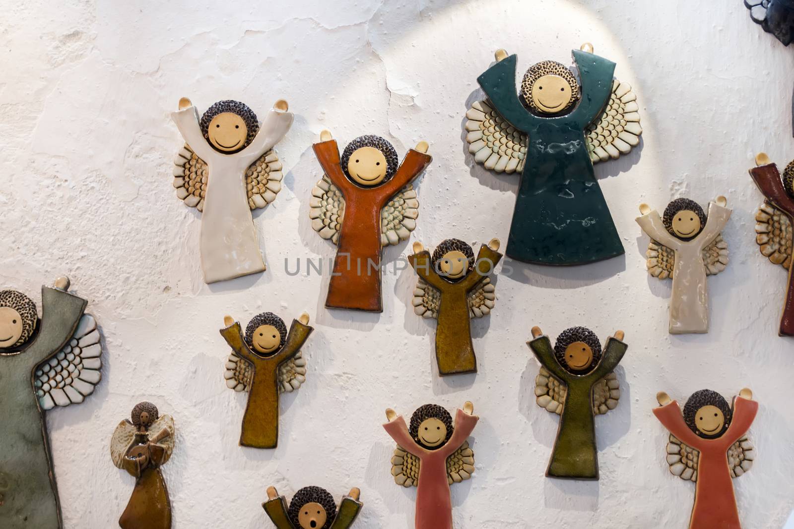 Ceramic souvenir angels from Monchique village, Portugal.
