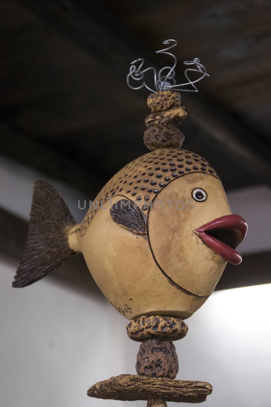 Colorful souvenir ceramic fish from Monchique village, Portugal.