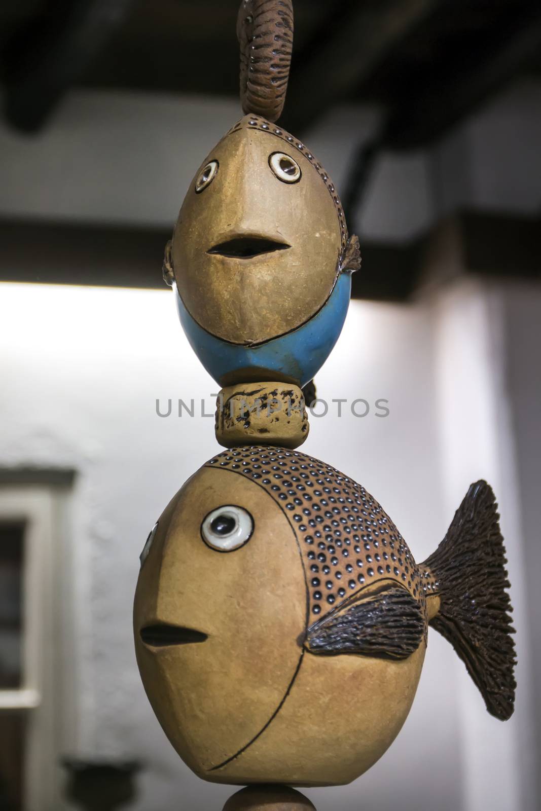 Colorful souvenir ceramic fish from Monchique village, Portugal.