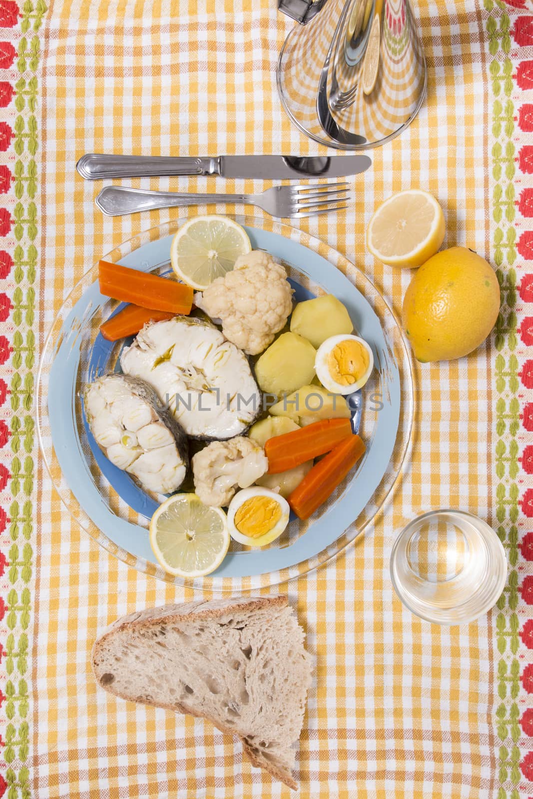 Typical portuguese meal with hake fish with cauliflower, carrots and potatoes.
