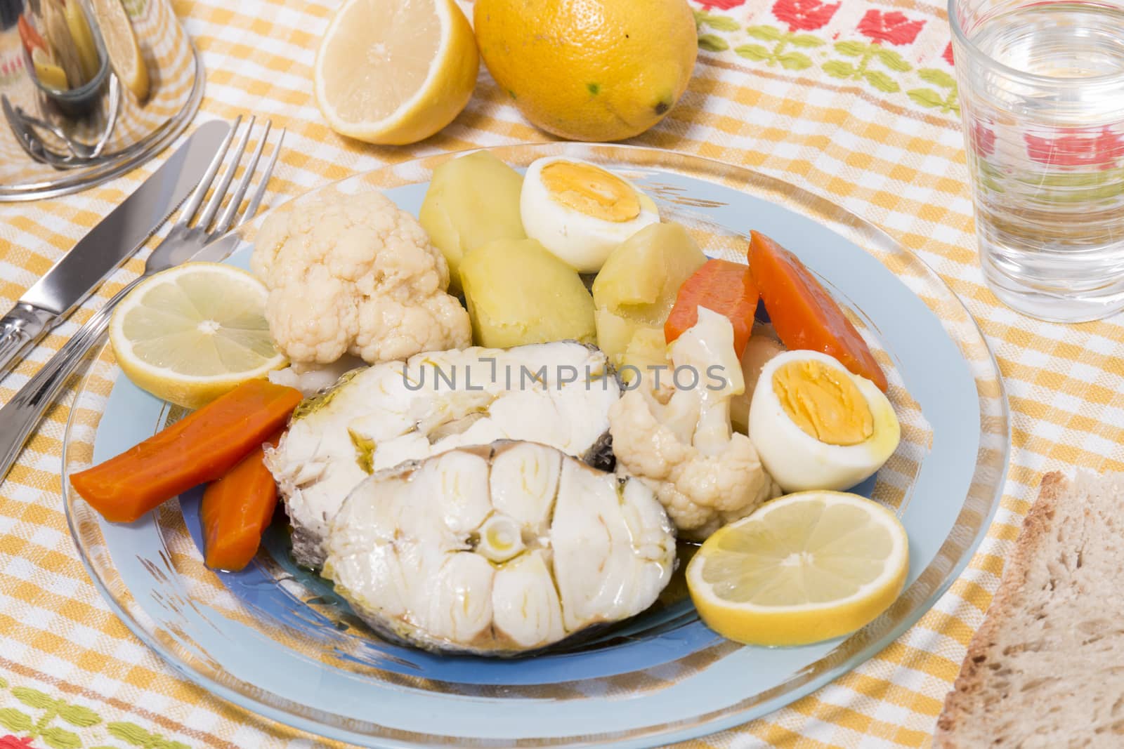 Typical portuguese meal with hake fish with cauliflower, carrots and potatoes.
