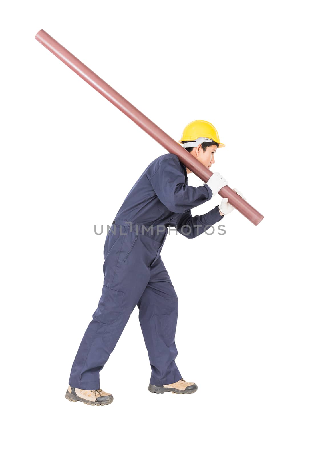 Young plumber in unifrom holding pvc pipe isolated on white background