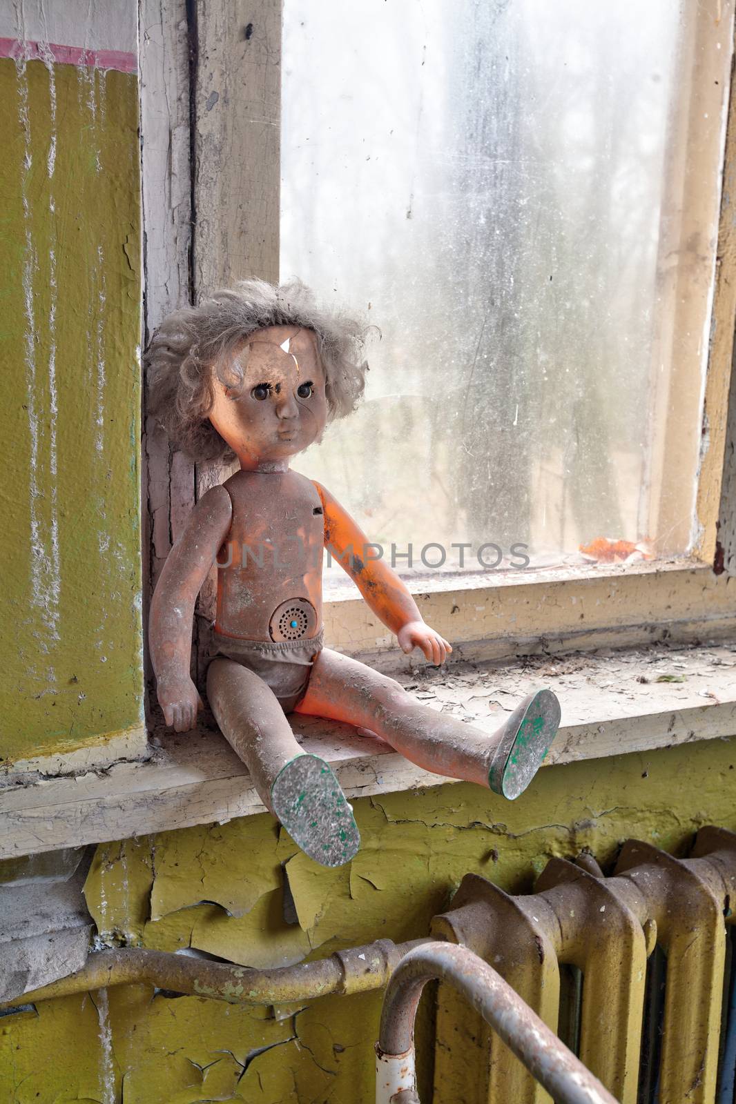 Dirty radioactive doll in kindergarten. Chernobyl, Ukraine