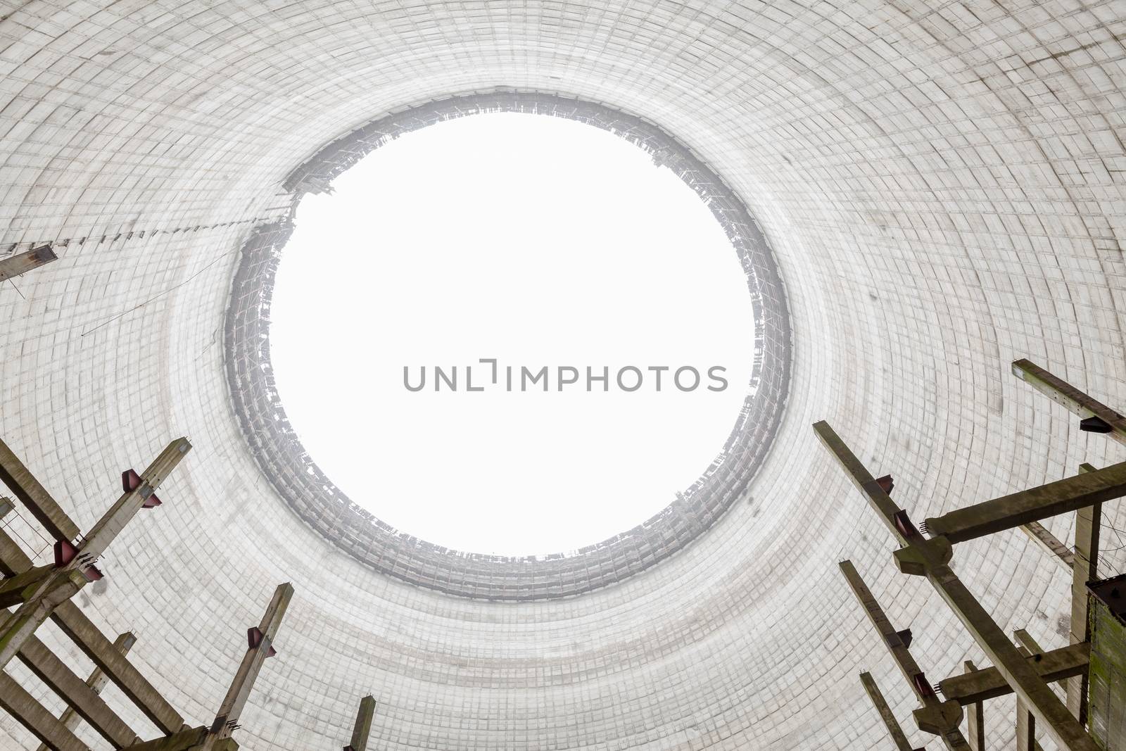 Futuristic view inside of cooling tower of unfinished Chernobyl nuclear power plant by igor_stramyk