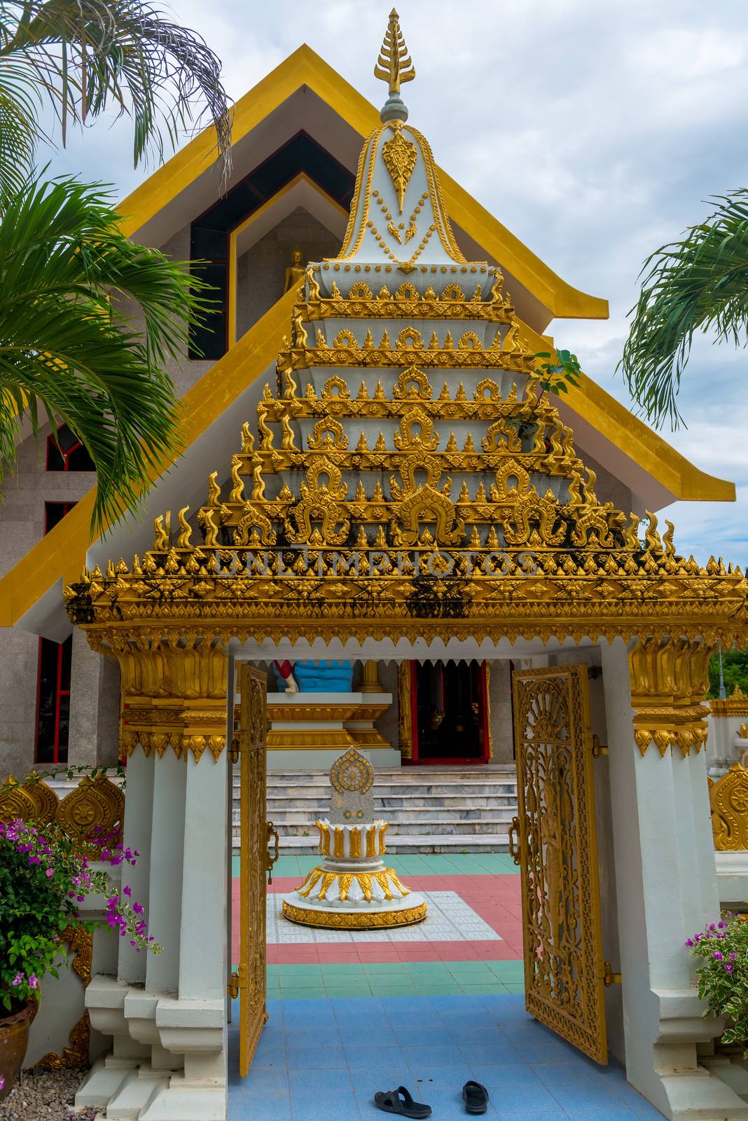 beautiful temple in Thailand, entrance and a pair of shoes by kosmsos111