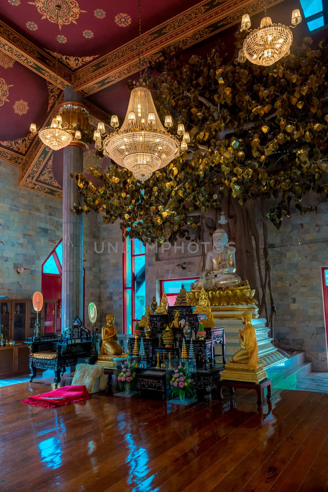 beautiful altar with Buddha in the empty Buddhist temple of Thai by kosmsos111