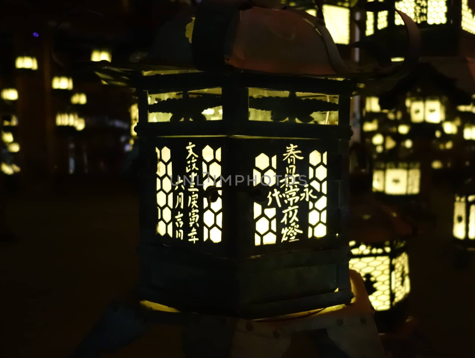 Lanterns lighting in the dark, Kasuga-Taisha Shrine, Nara, Japan by daboost