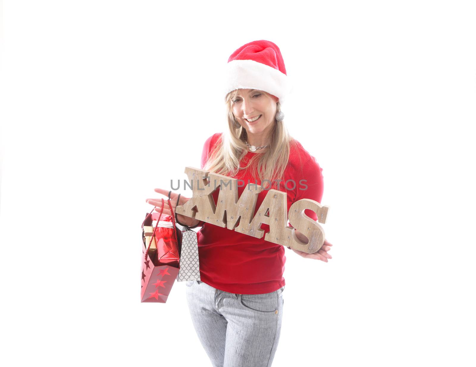 Festive woman with Christmas signage