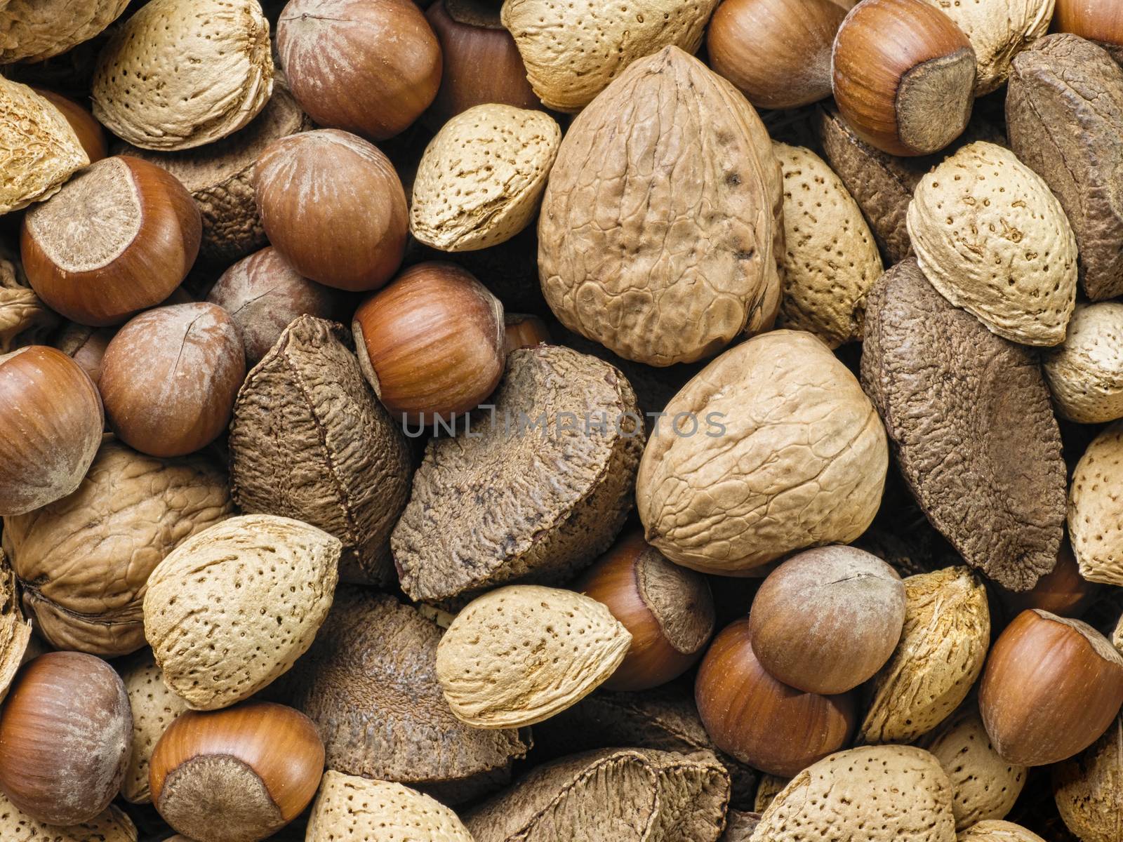 close up of assorted mixed nuts food background