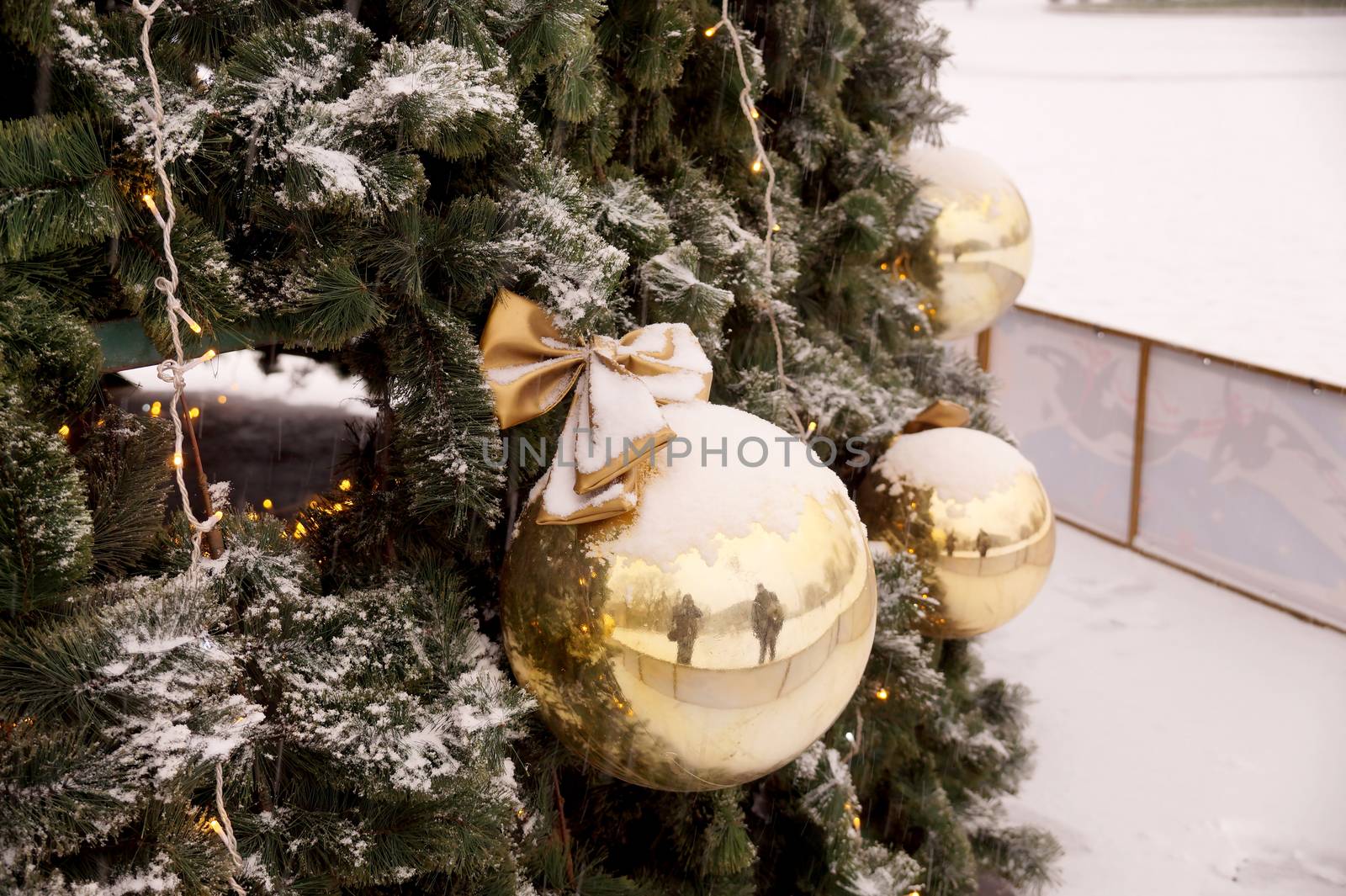 Christmas decoration of shopping center spheres, bows and branches of a fir-tree