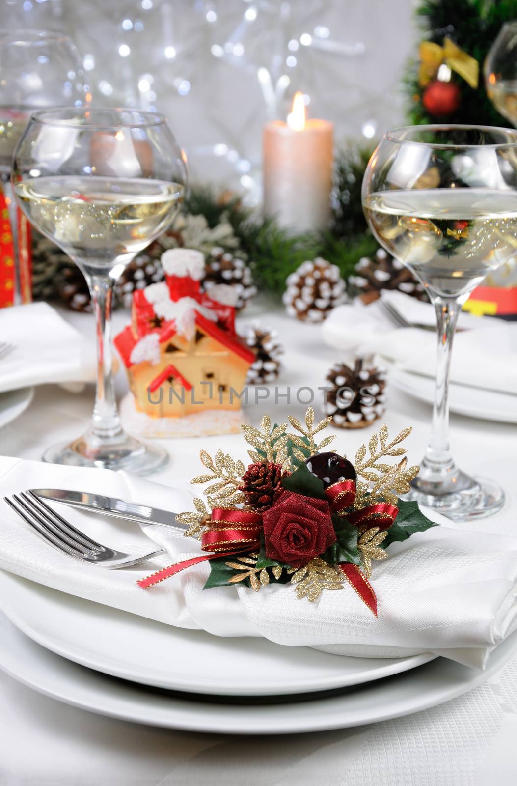 Linen napkin, decorated with Christmas Corsage  on the table