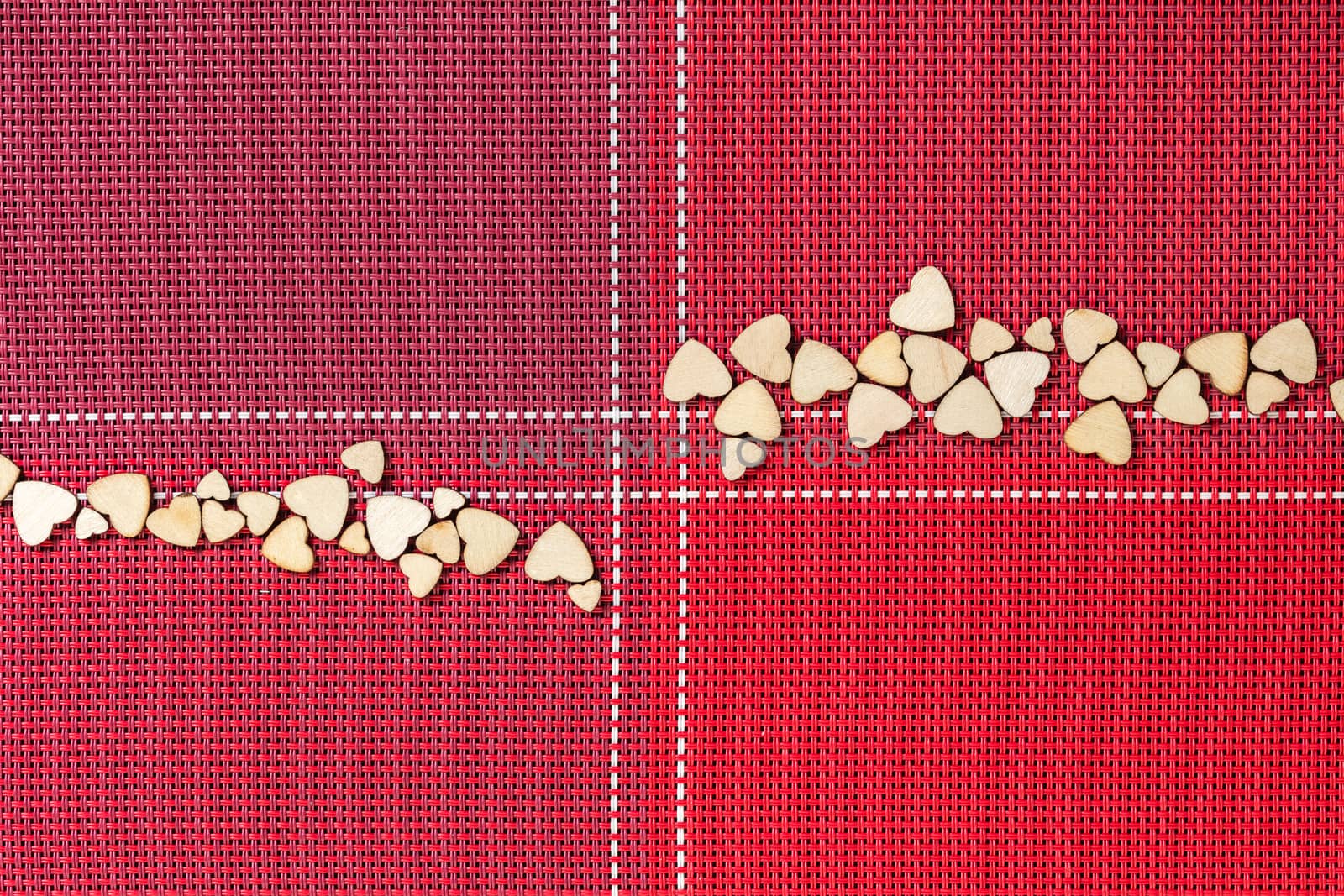 festive background, red napkin with hearts close-up