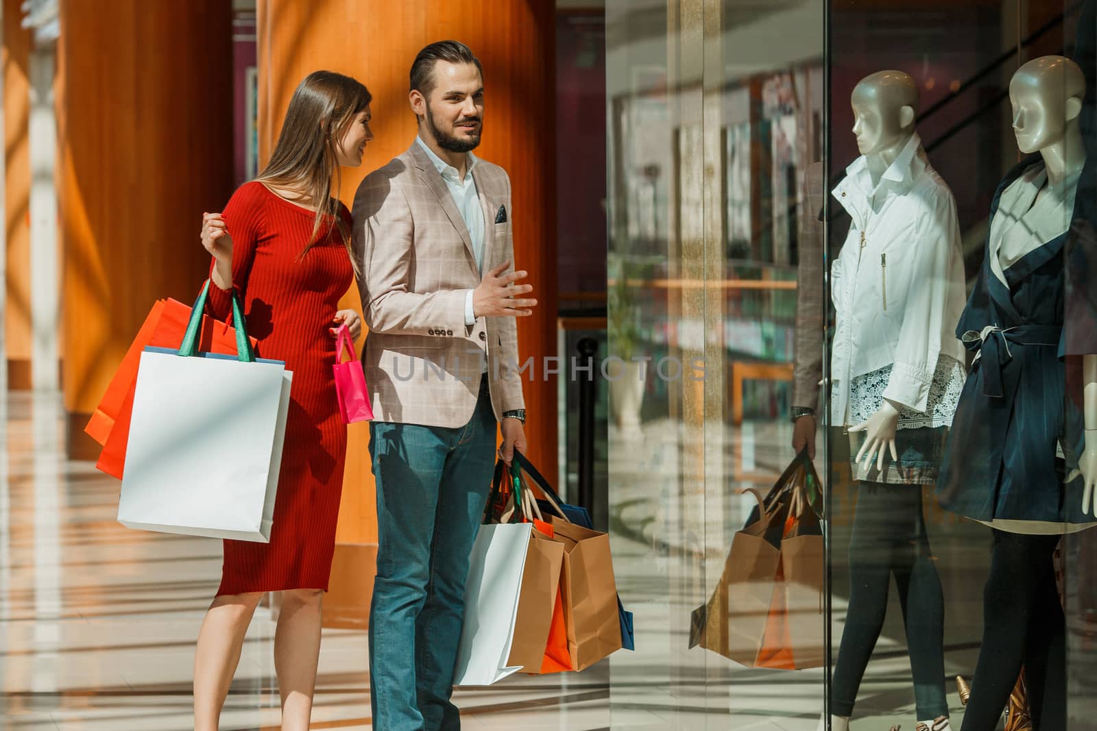 Couple with shopping bags by ALotOfPeople