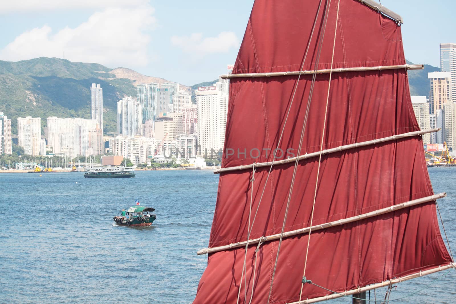 Chinese sailing ship in Hong Kong Victoria Habour at day