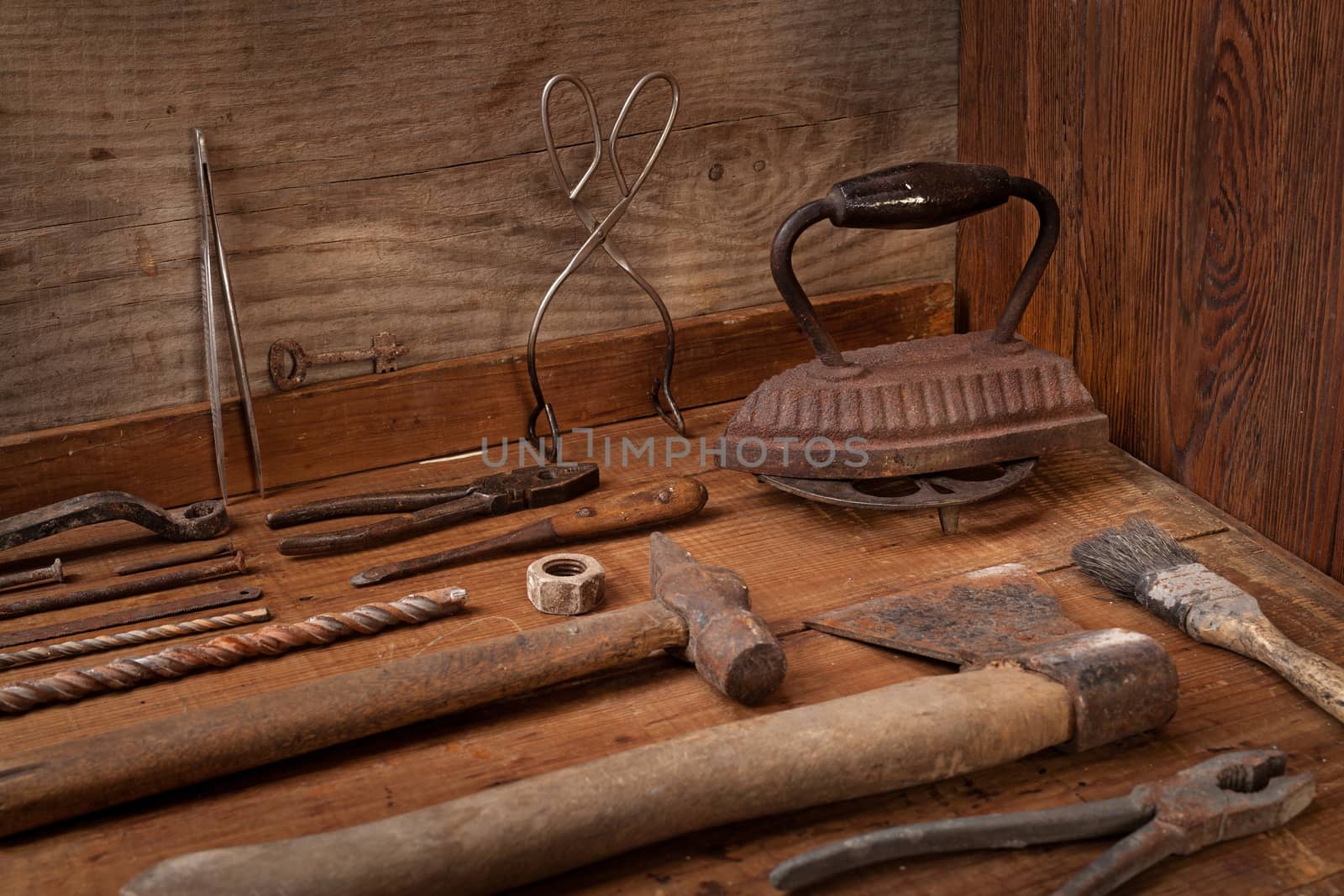 Collection of vintage tools on a blue wooden background by igor_stramyk