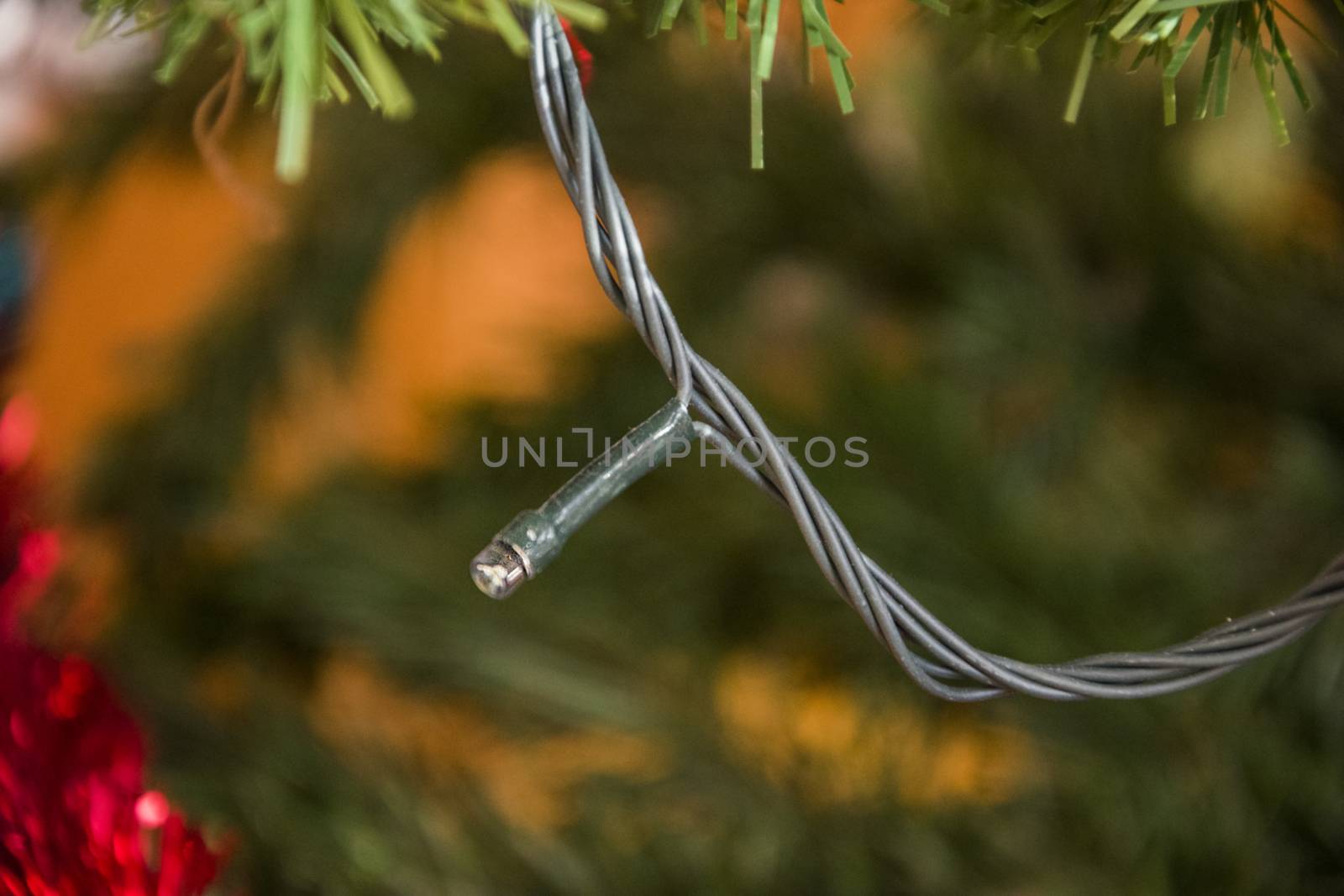 christmas light on christmas tree. Beautiful close up holiday photo. 
