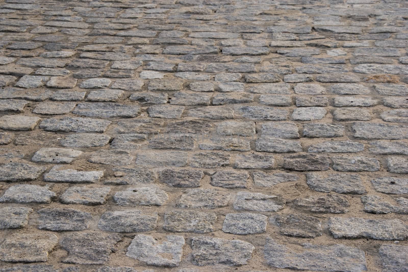 old paving stone, pavement footpath close up photo