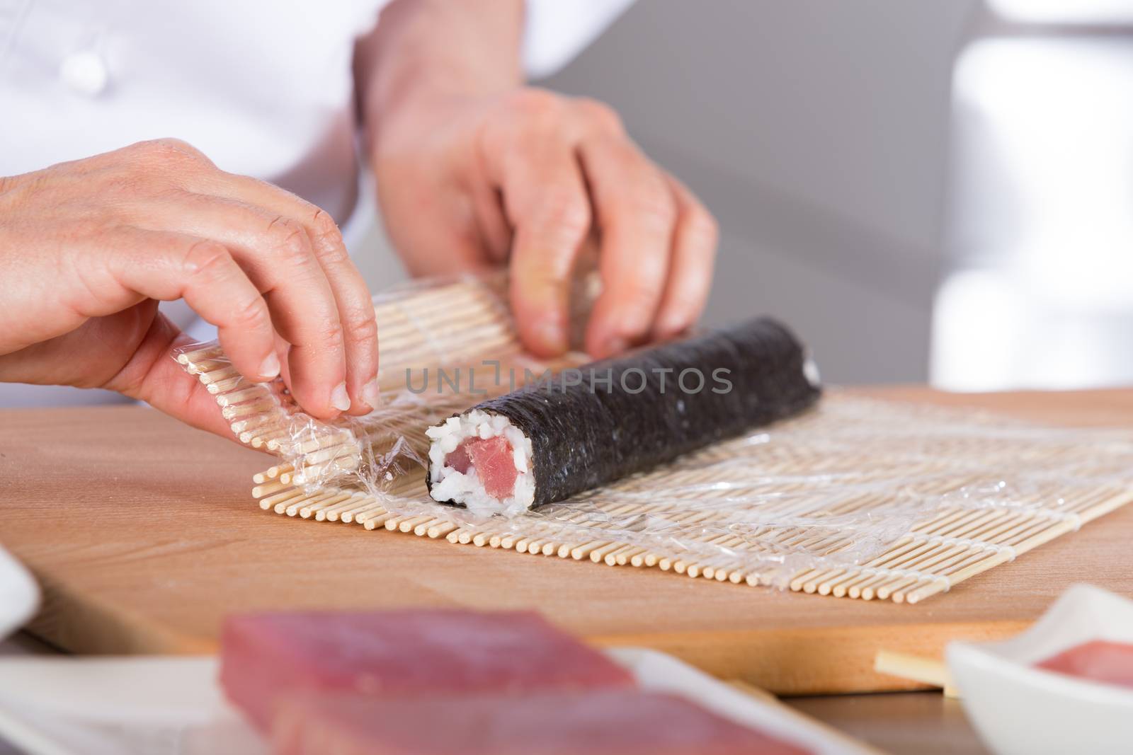 Chef preparing delicious sushi in a restaurant