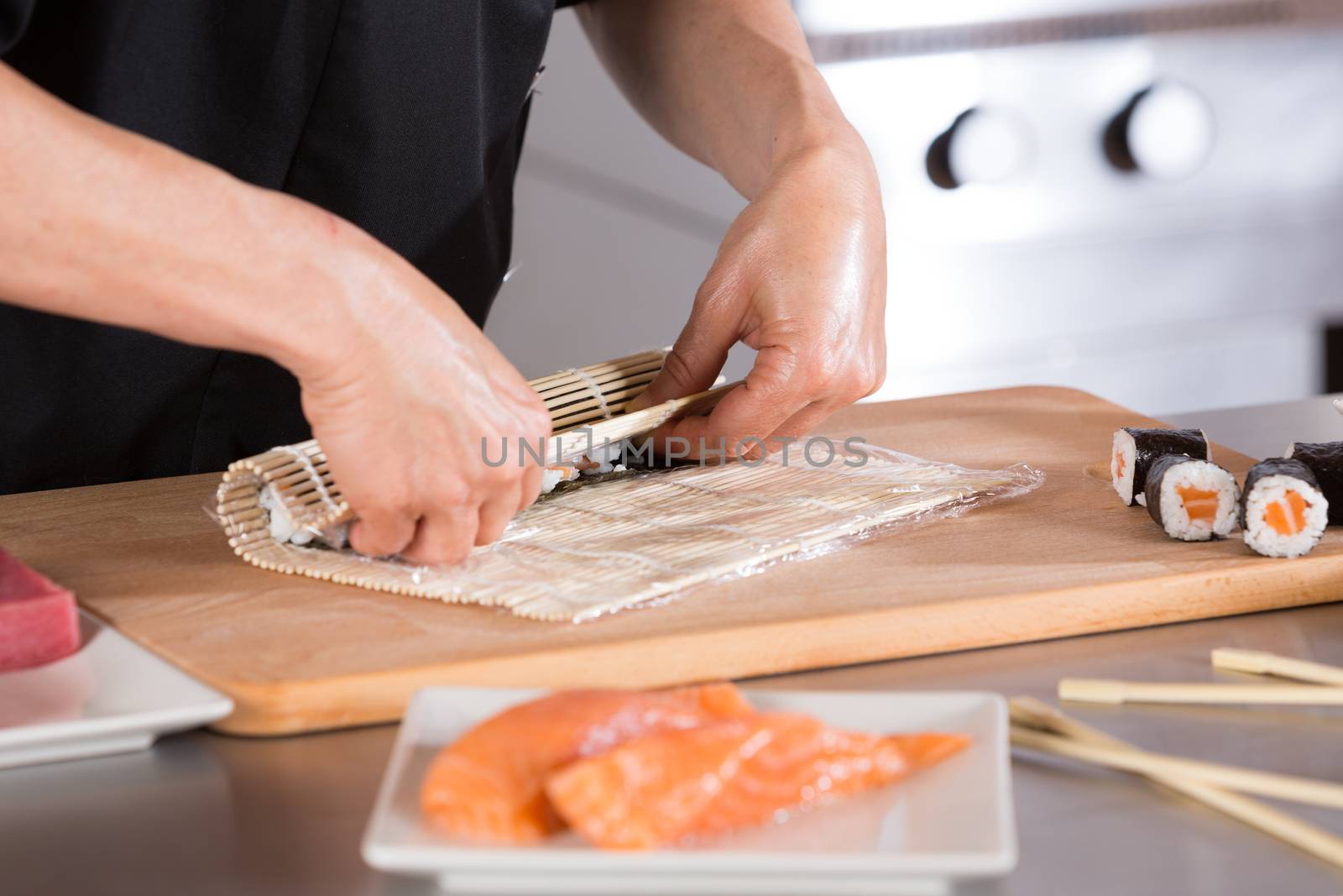Chef preparing delicious sushi in a restaurant
