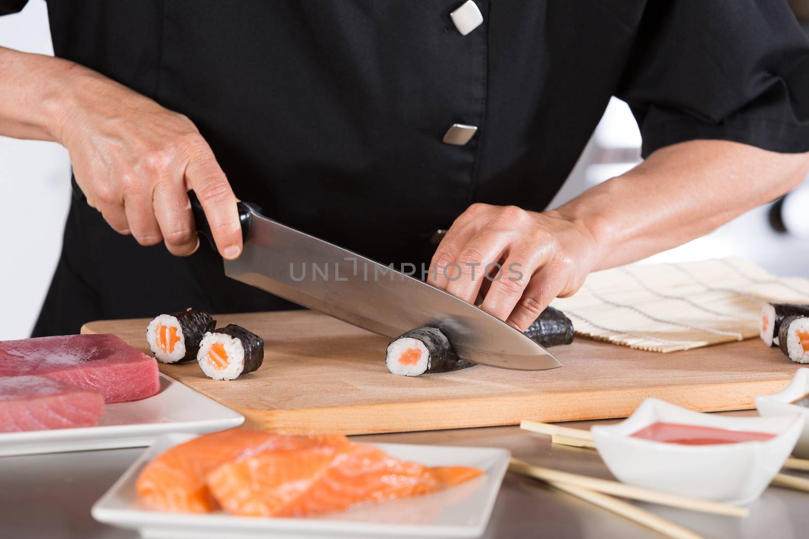 Chef preparing delicious sushi in a restaurant