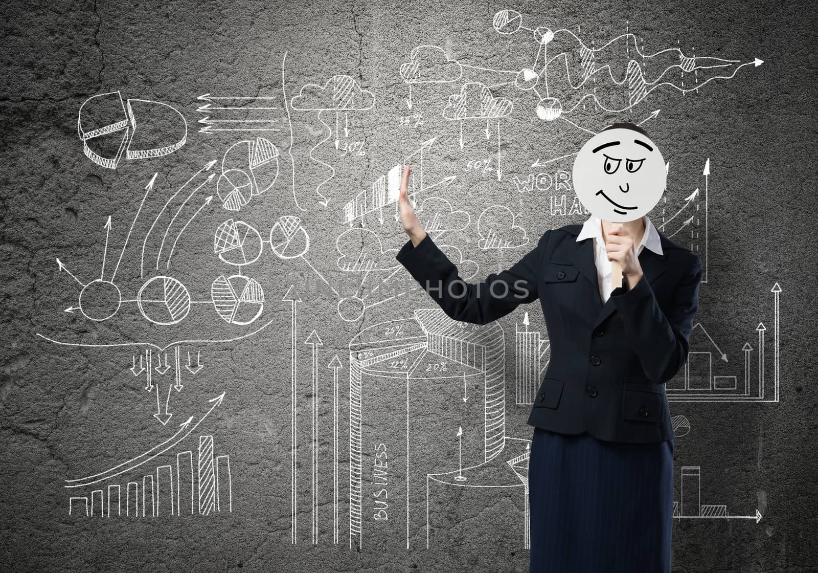 Businesswoman and graphs at background hiding her face behind mask