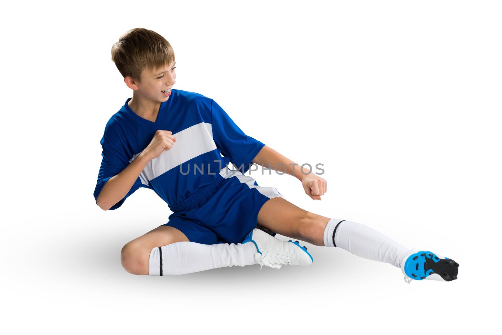 Boy football player in blue uniform against white background