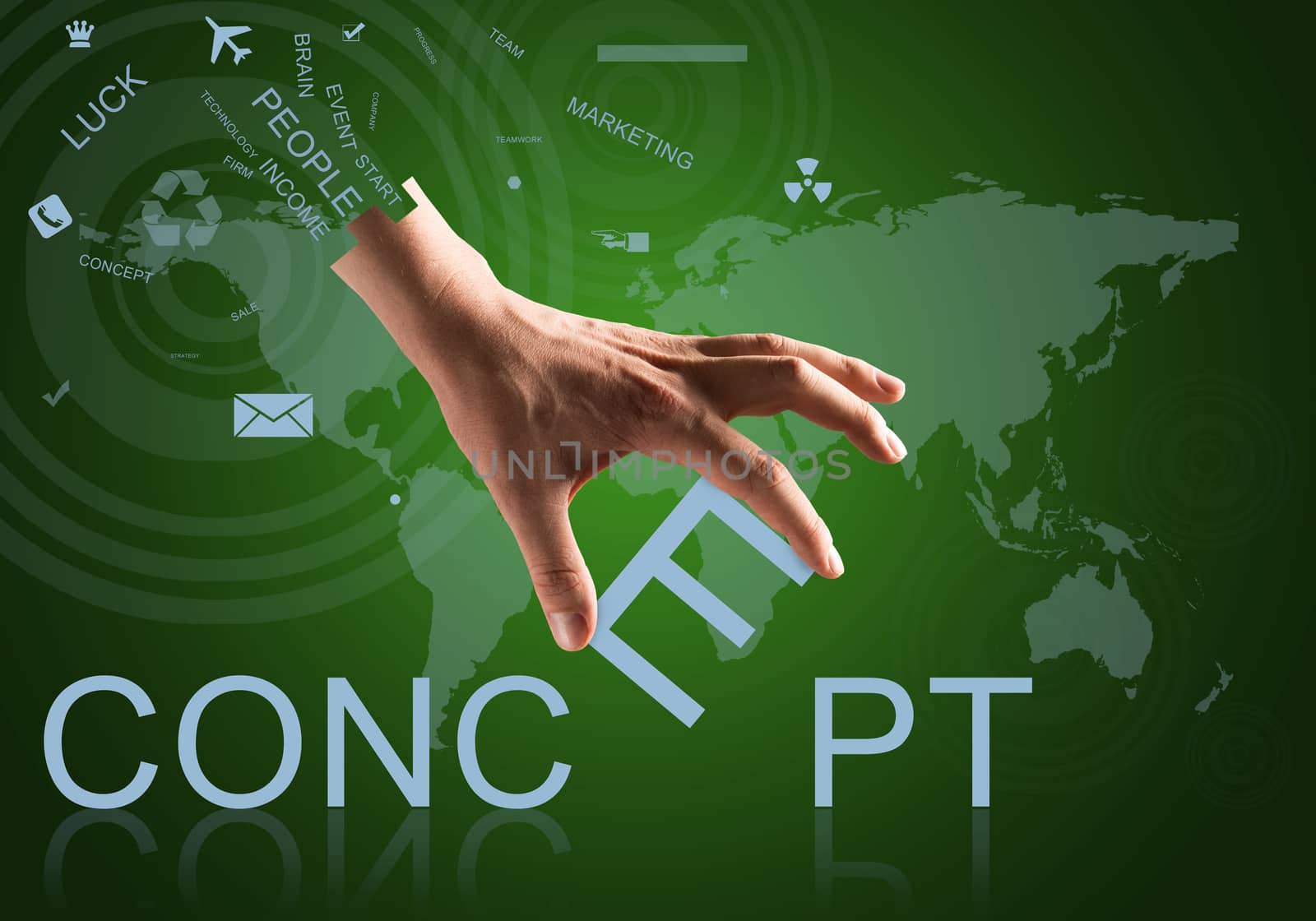 Close up of hand holding one letter of word