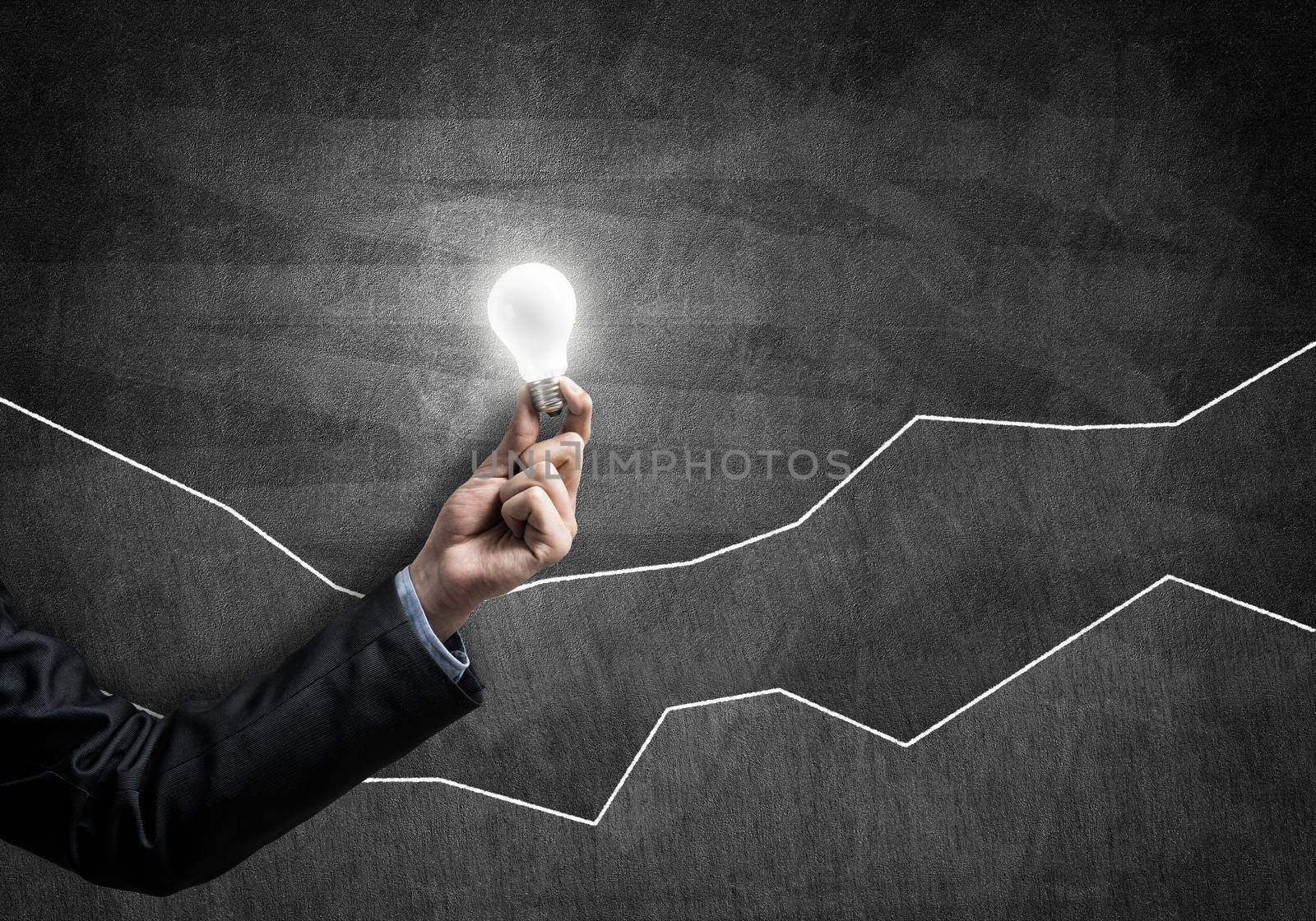 Conceptual image with light bulb diagrams and graphs