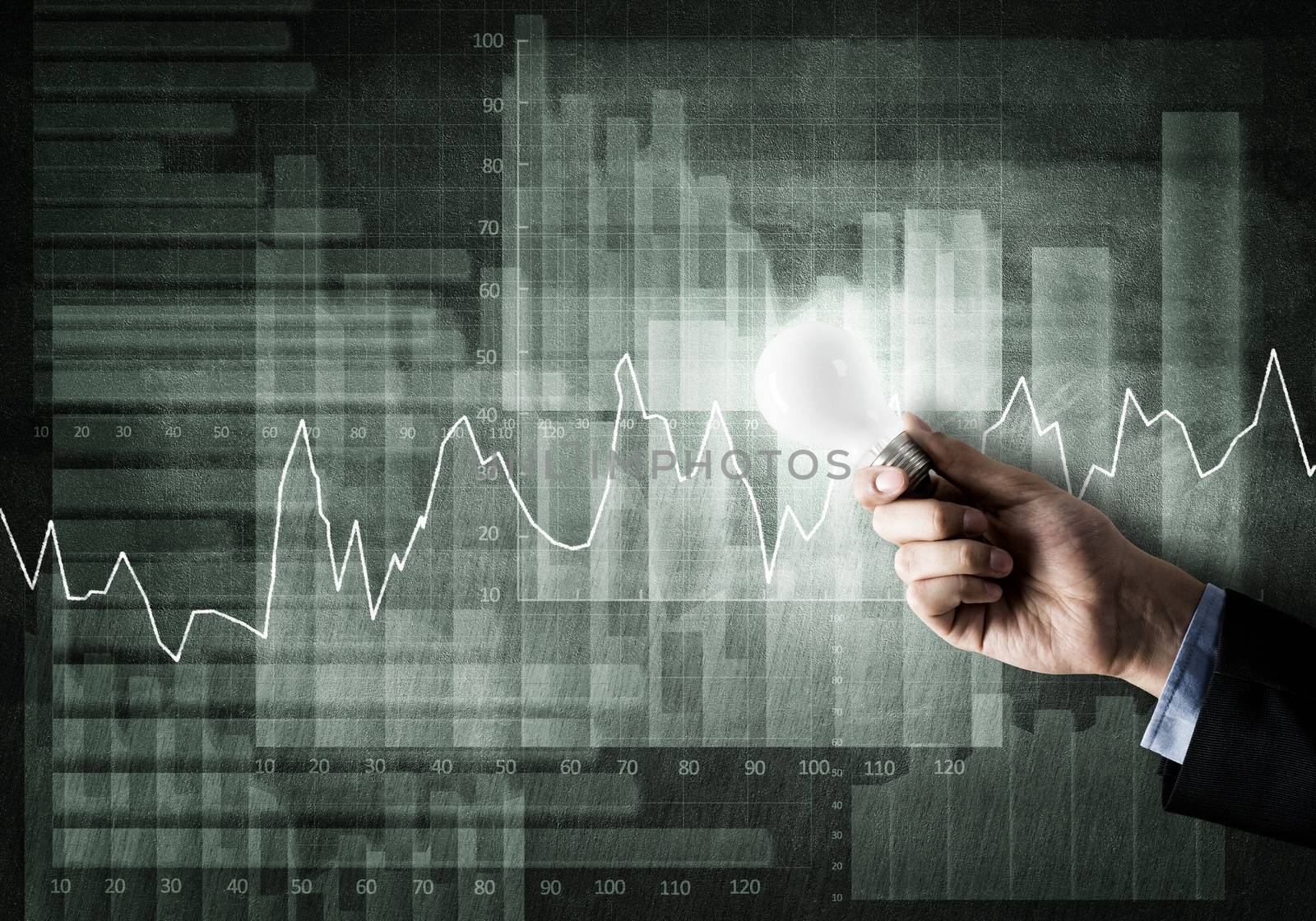 Conceptual image with light bulb diagrams and graphs