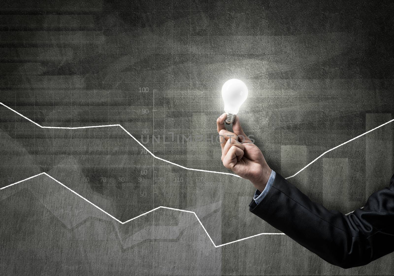 Conceptual image with light bulb diagrams and graphs