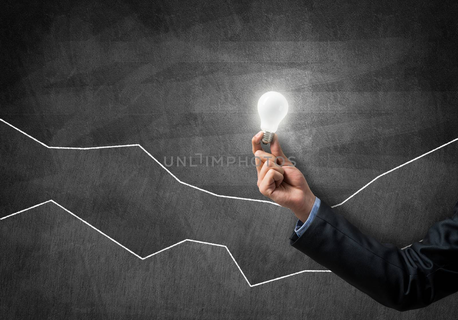 Conceptual image with light bulb diagrams and graphs