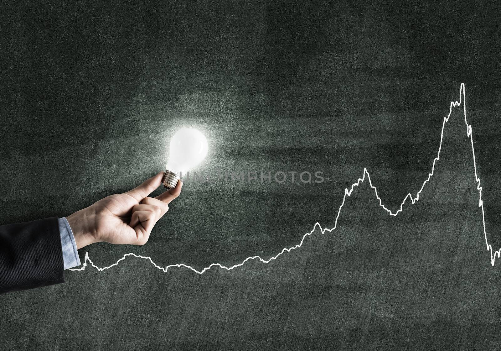 Conceptual image with light bulb diagrams and graphs